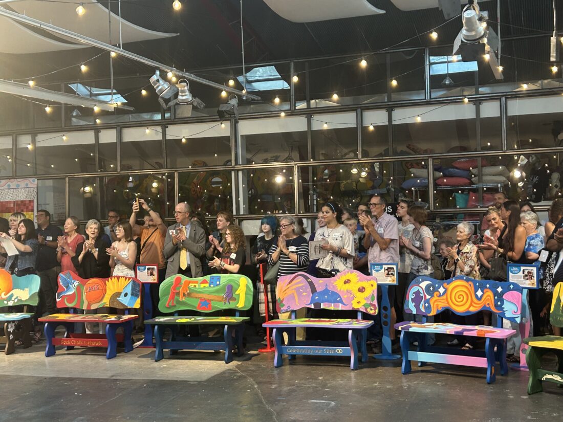 Hundreds celebrate the unveiling of 20 new benches created by young artists with nonprofit Van Go